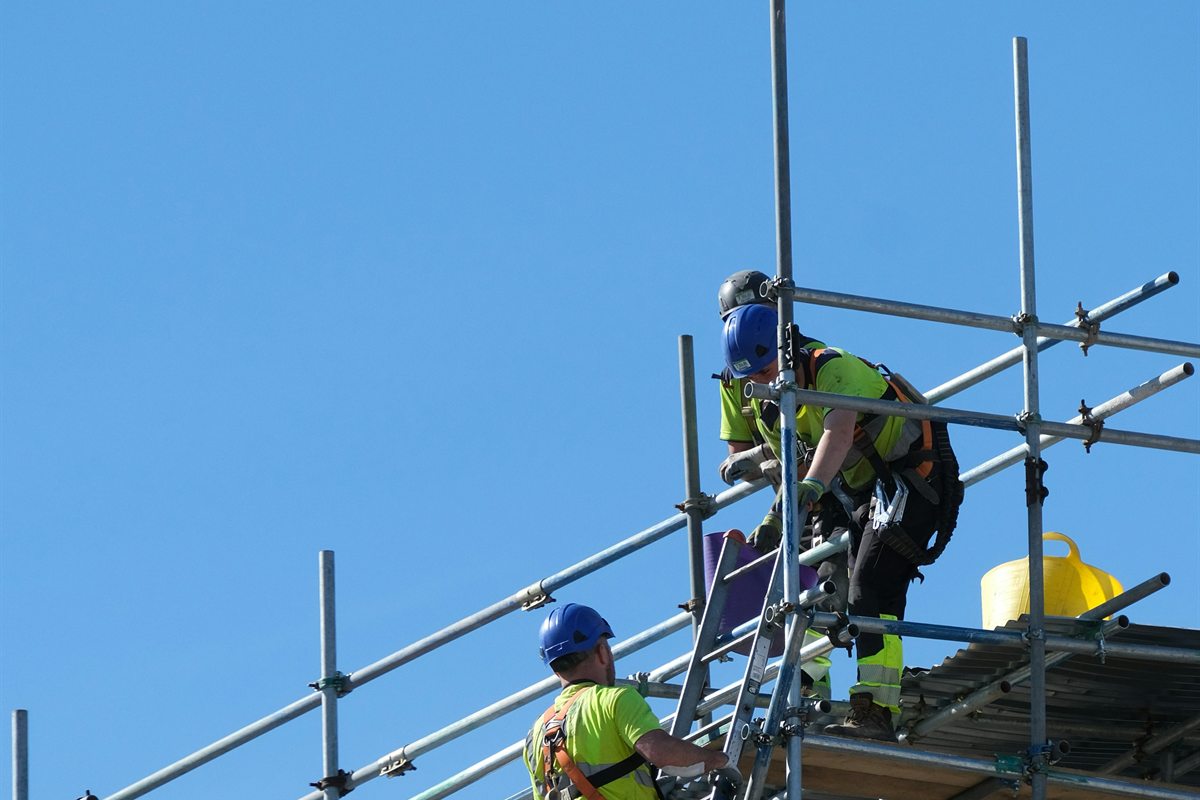 Scaffolders working on a raised structure